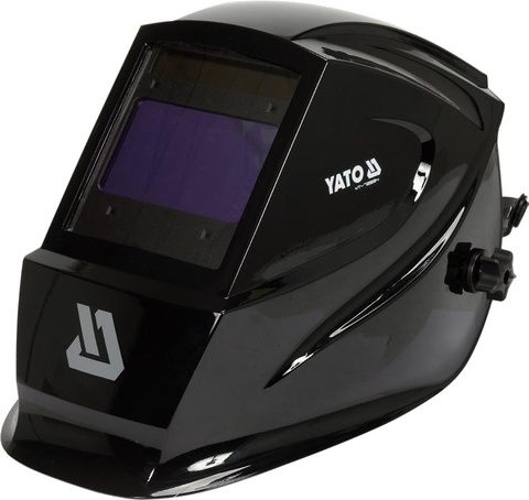 Auto-darkening welding helmet