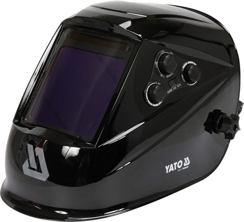 Auto-darkening welding helmet